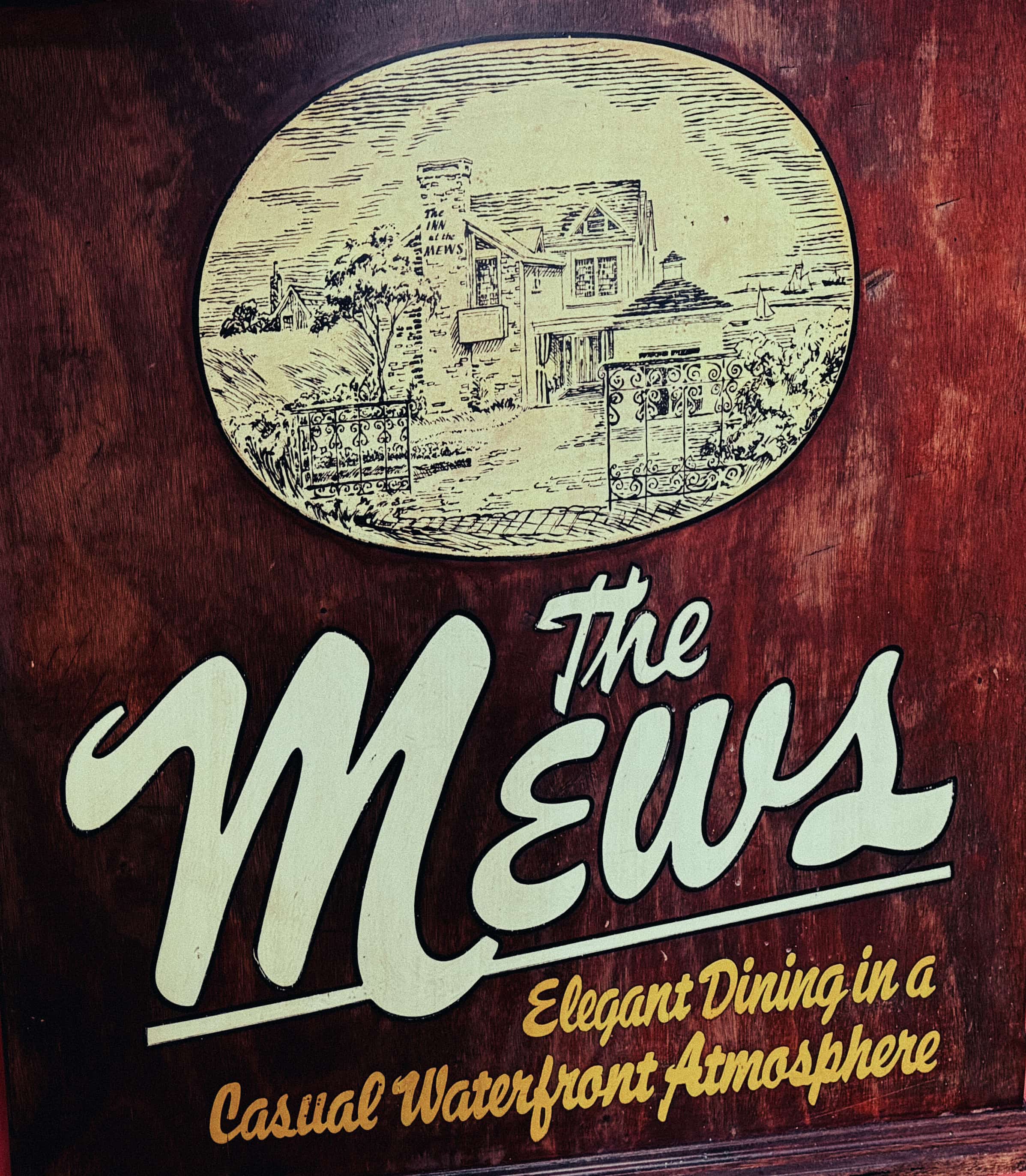 A depiction of the original Mews location in a historic Provincetown courtyard.