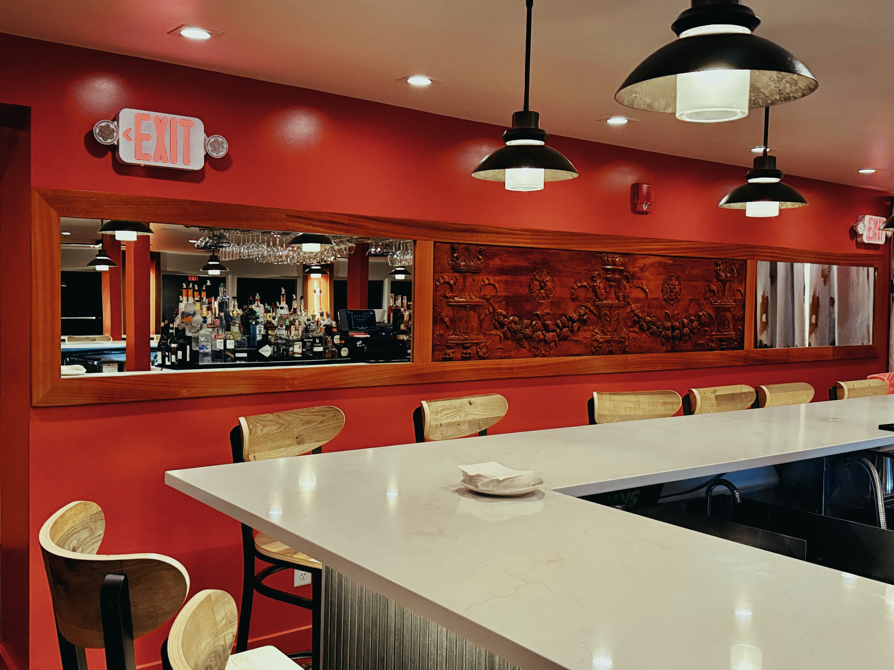 The elegant and warm interior of The Mews dining room.