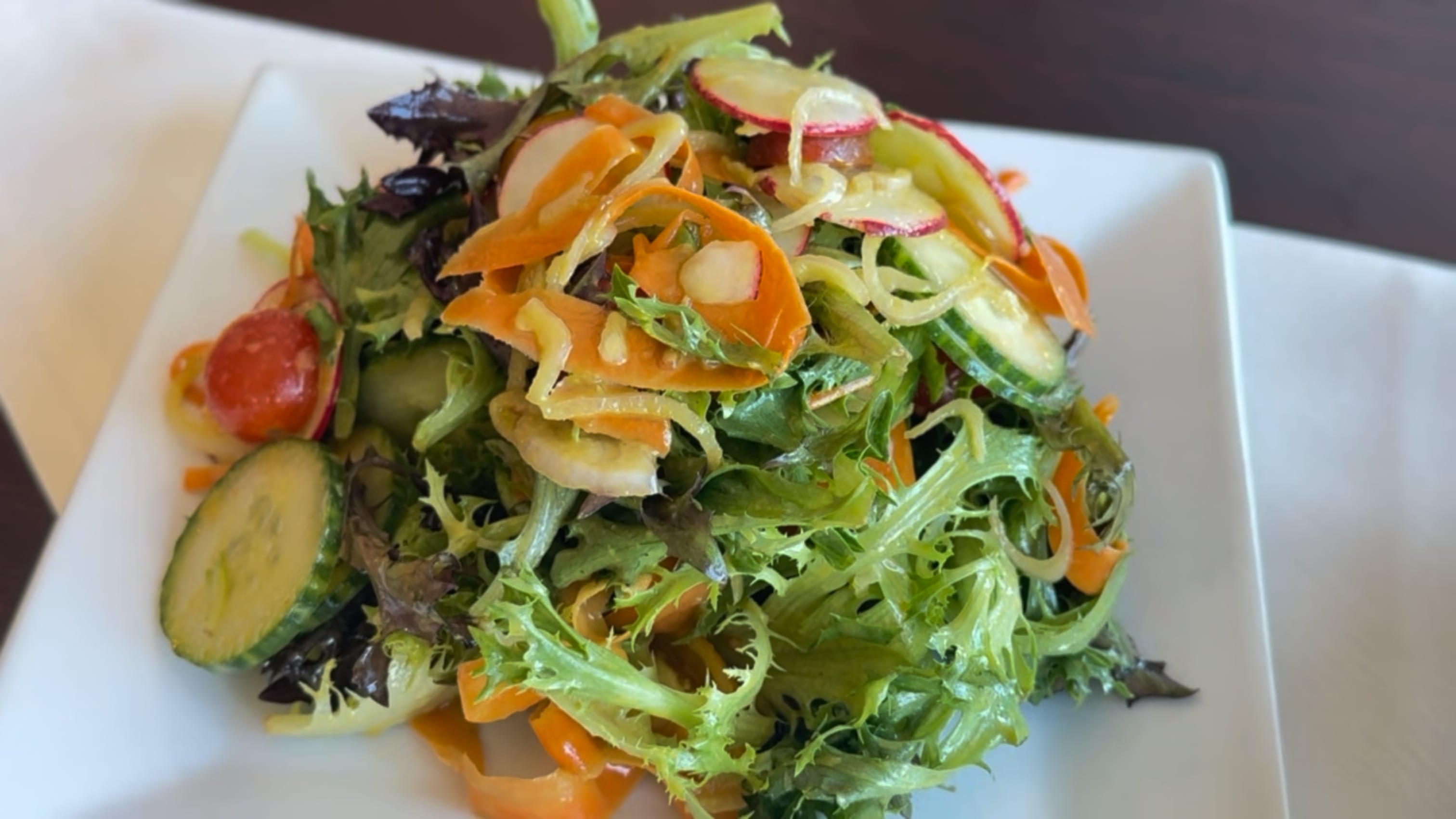 A beautifully plated gourmet dish from The Mews kitchen.