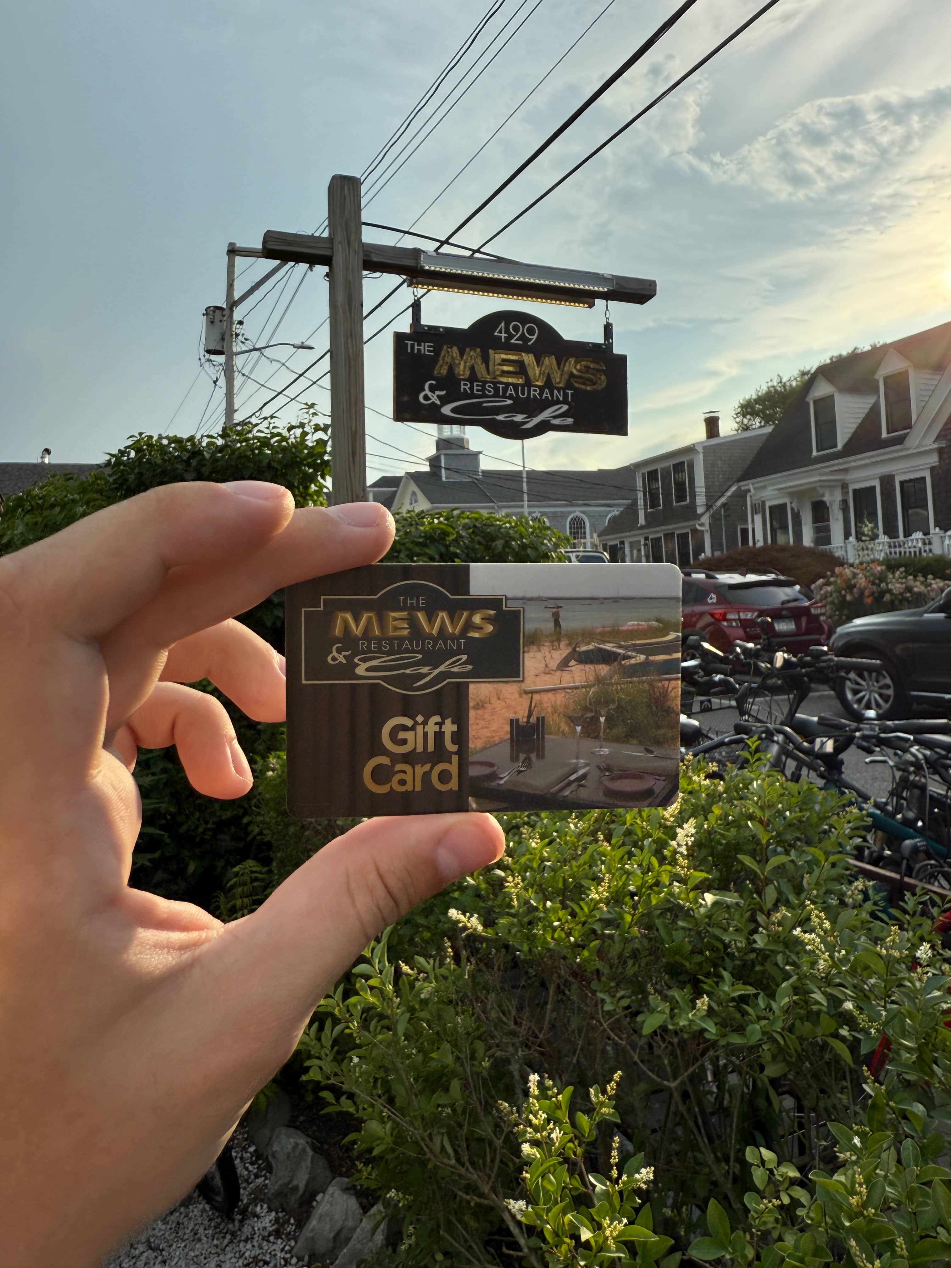 A stylish gift card for The Mews restaurant.